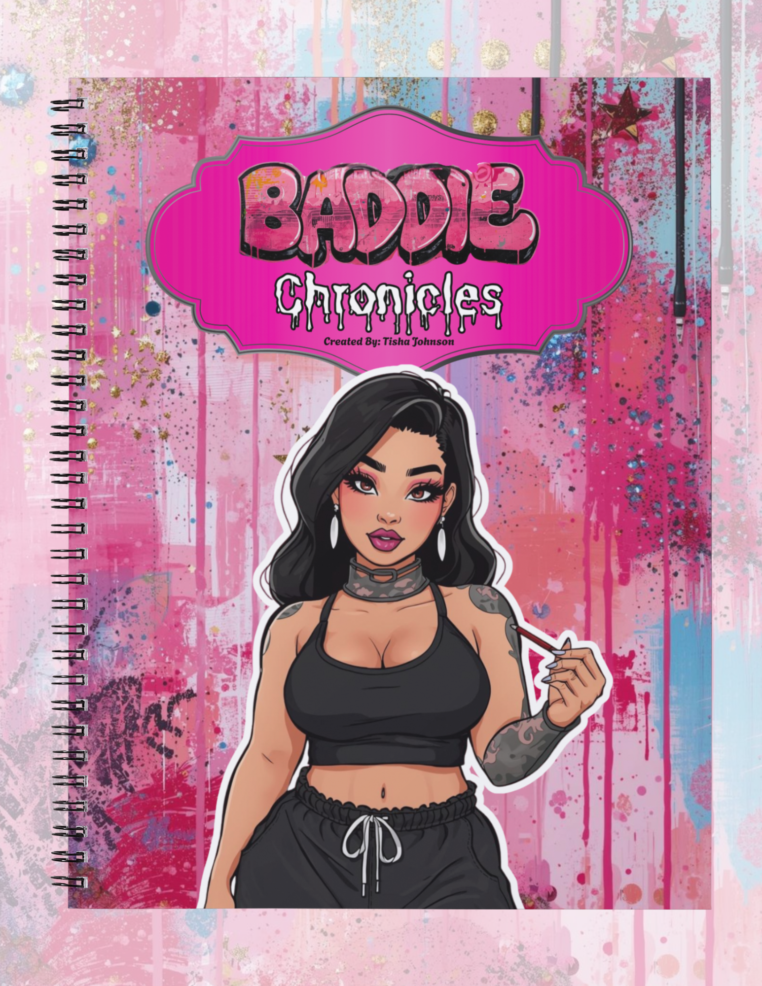 Notebook cover with 'Baddie Chronicles' design featuring a stylized illustration of a woman on a pink and blue abstract background.