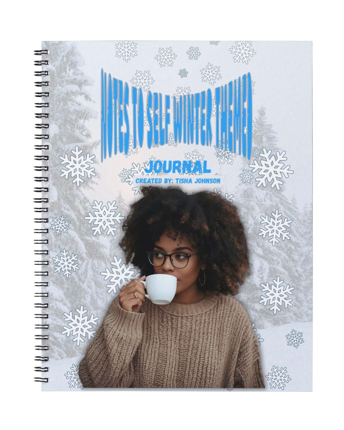Journal with a design of a person holding a mug and snowflakes.