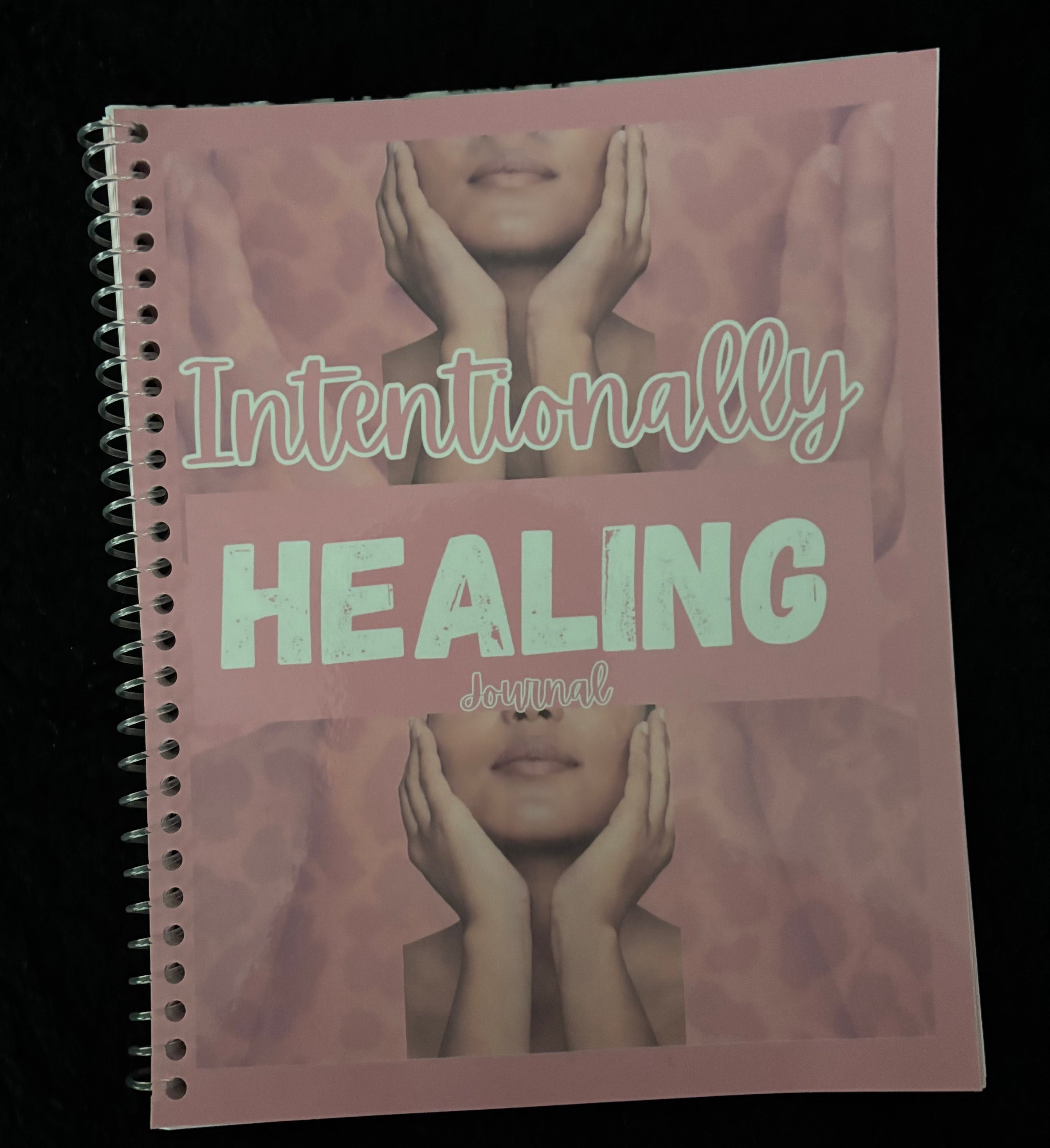 The cover of the pink intentionally healing journal.