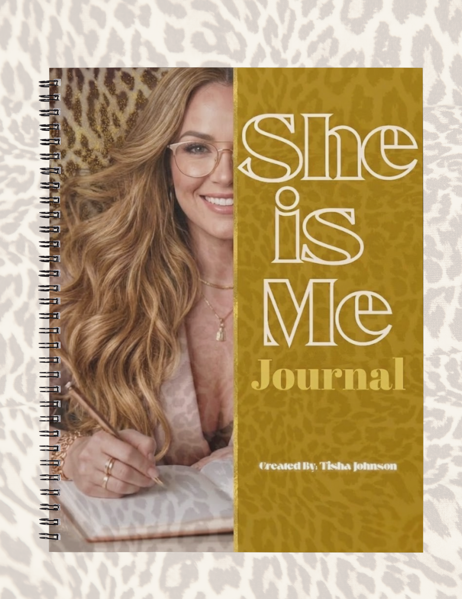 Journal titled 'She is Me' with a photo of a woman on the cover, on a textured beige background.