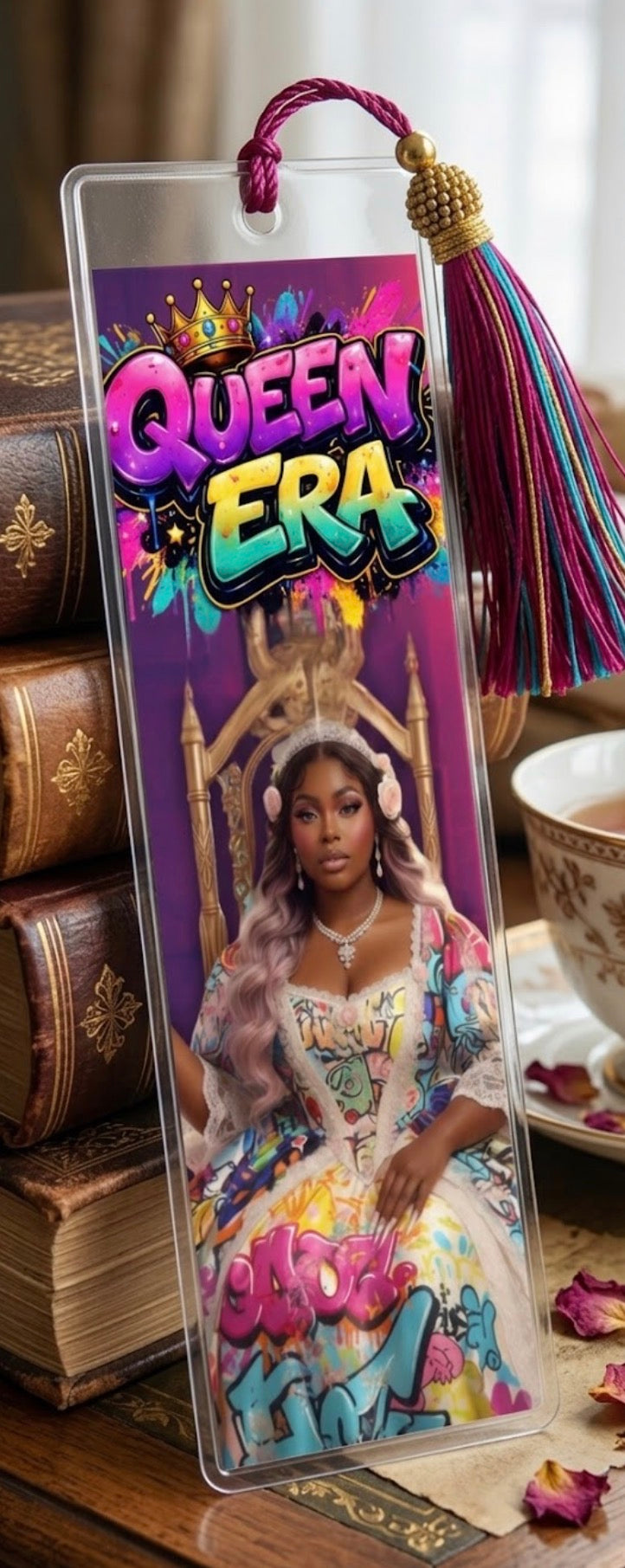 Decorative bookmark with 'Queen Era' design featuring a woman in a crown and colorful outfit.