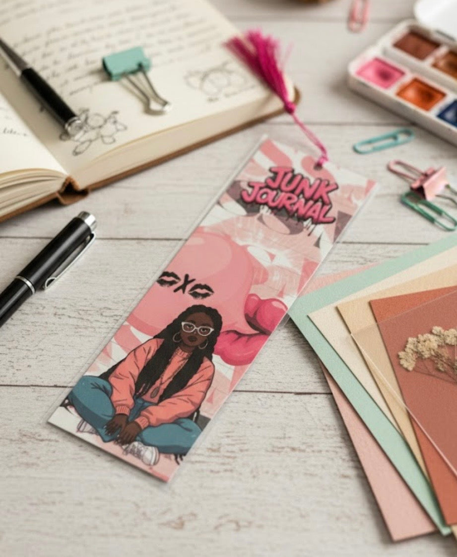 Junk Journal with illustration of a person on a wooden surface with stationery items.